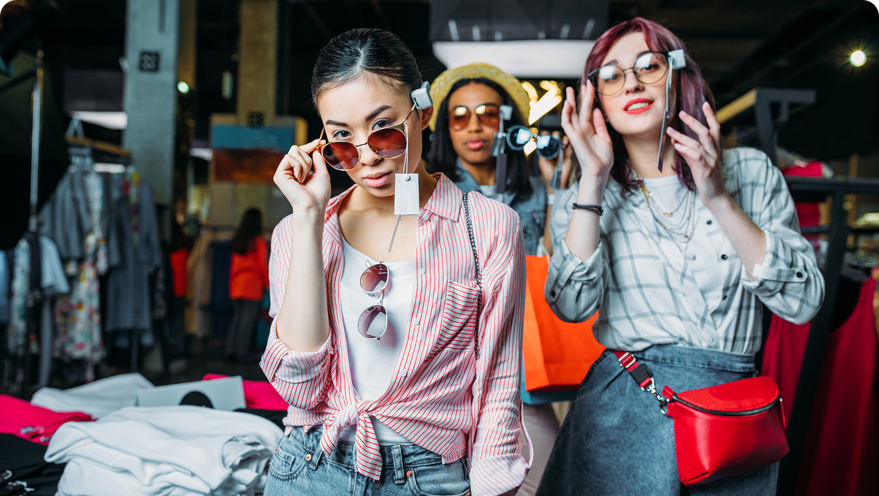Three young women shopping for resale fashion, featured by CP&KRELL